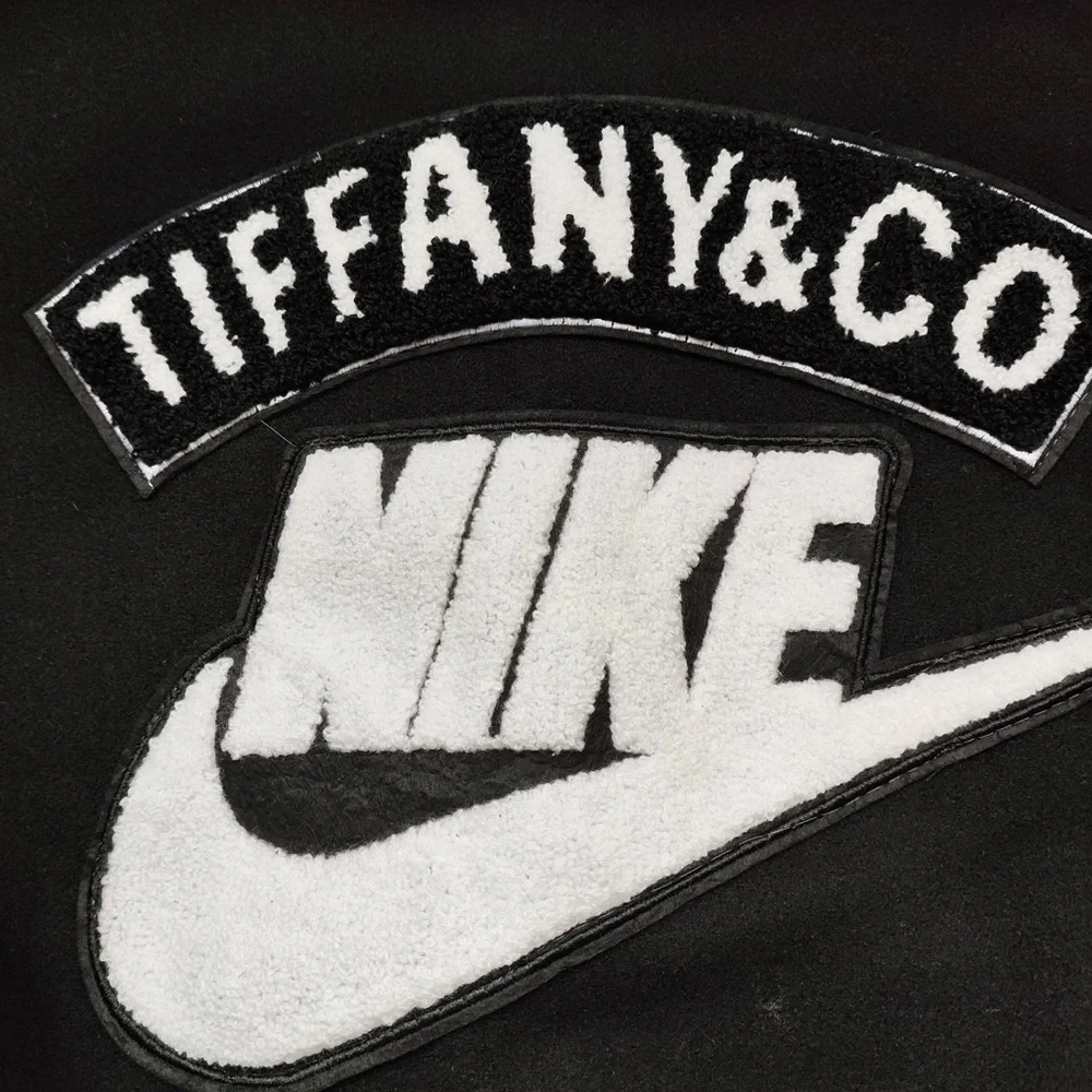 Nike Black Varsity Jacket with Mint Accents